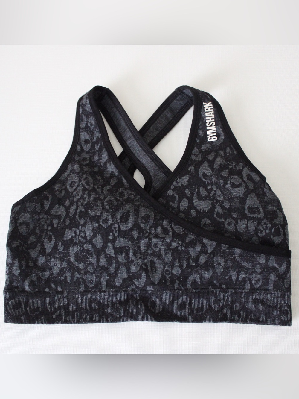 Gymshark Adapt Animal Sports Bra
Black Leopard Print Cross Back
Size Medium
